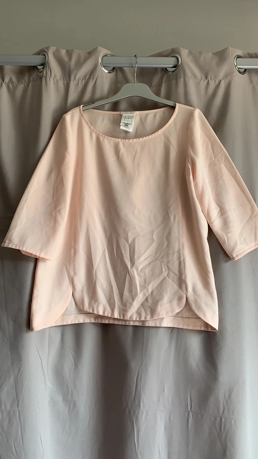Haut rose pâle
